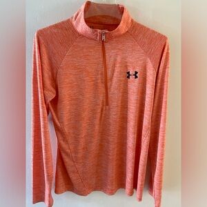 Great athletic attire. More of a orange tone in color.